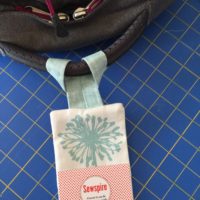 How to sew a fabric luggage tag