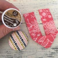 How to make a fabric covered button and add a tab closure to a bag