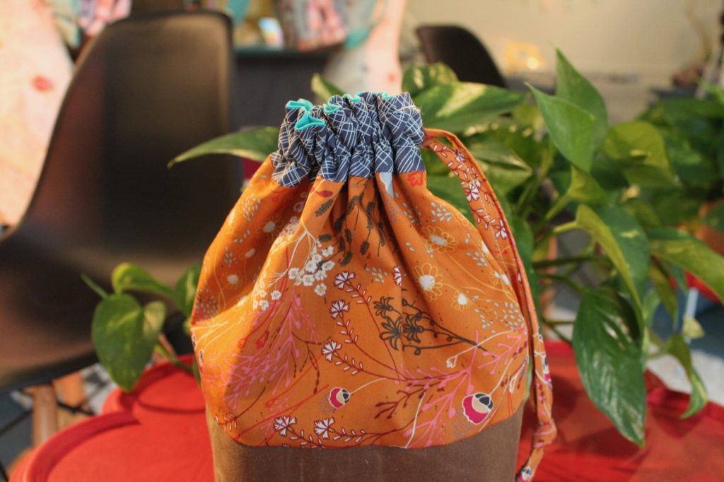 How to sew a drawstring bag with waxed canvas base by Sewspire
